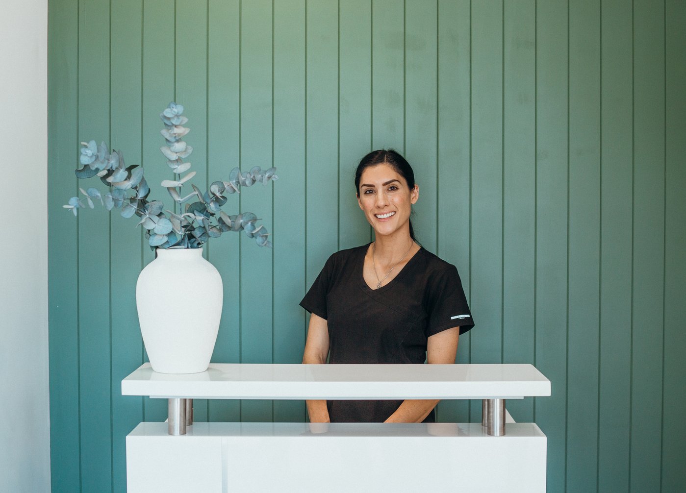 Michelle at the reception desk of Southwest Beauty Co., Margaret River
